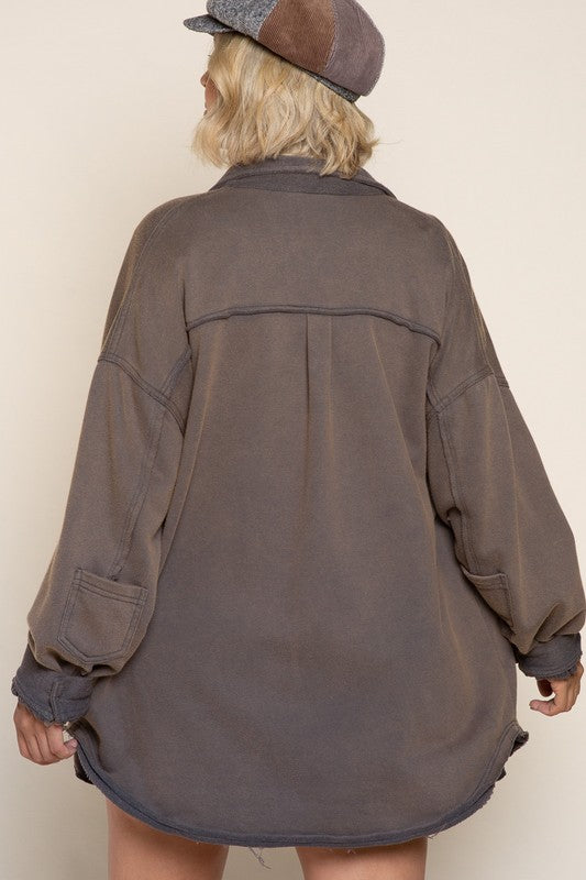 A Jacket With 4 Pockets With 2 Flap Pocket On Front Bust And 2 Bottom Side Pockets