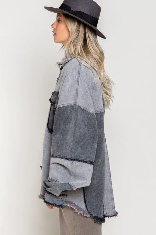 Trendy Shacket Featuring An Oversized Fit And Frayed Edge Hem