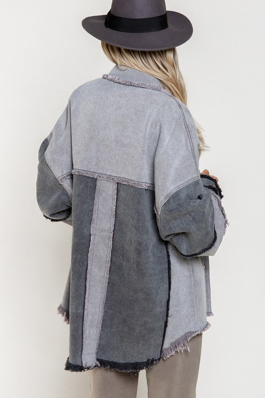 Trendy Shacket Featuring An Oversized Fit And Frayed Edge Hem